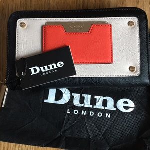Dune London Kannah wallet. Black w/beige and orange accent colors. New